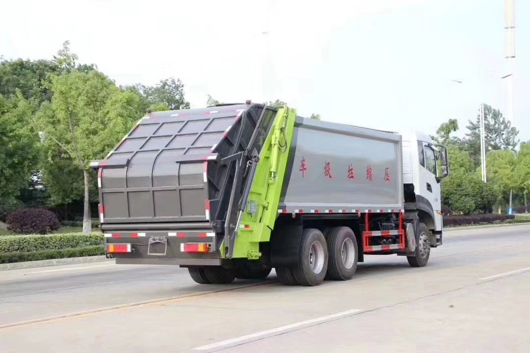国六东风天龙后双桥压缩式垃圾车实拍图片
