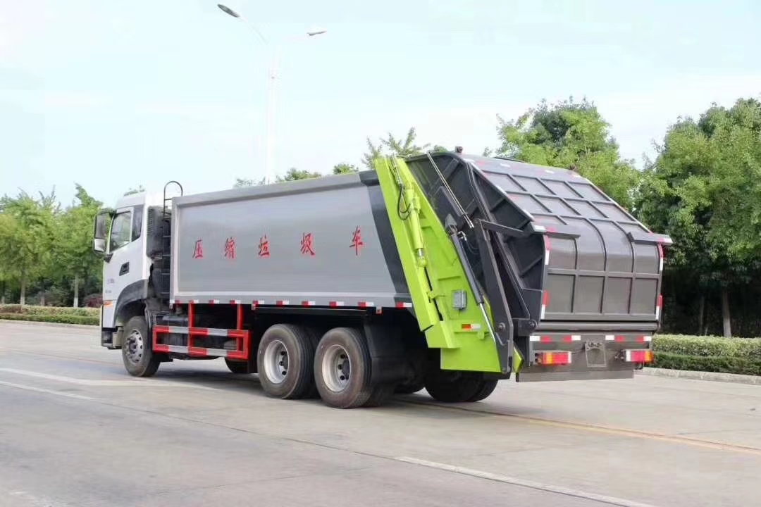 国六东风天龙后双桥压缩式垃圾车实拍图片