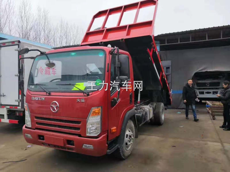 大运蓝牌带自卸平板车图片