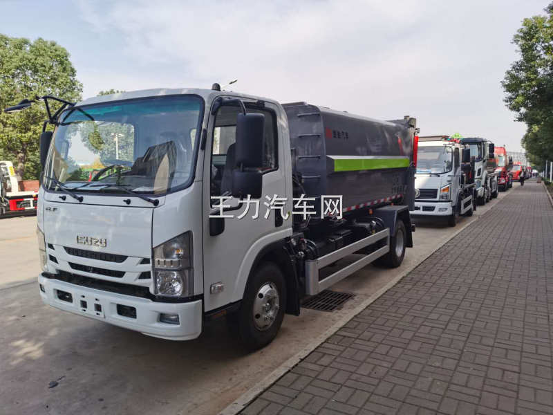 新款五十铃7方压缩垃圾车图片