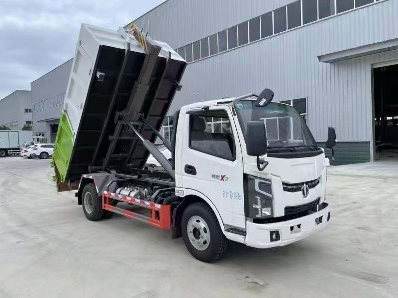 飞碟奥驰X2国六蓝牌12吨王钩臂垃圾车